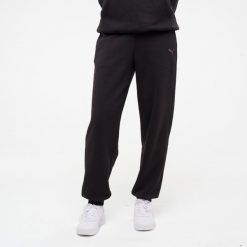 Spodnie fitness damskie Puma. Czarne spodnie materiałowe Puma, bez wzorów, z bawełny, sportowe. Za 129.99 zł.