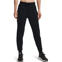 Spodnie treningowe damskie Under Armour New Fabric Hg Armour. Czarne spodnie dresowe Under Armour, bez wzorów, z dresówki. Za 182.99 zł.