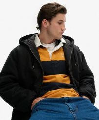 Superdry Kurtka z kapturem Canvas Surplus z bawełny z pikowaną podszewką. Czarne kurtki Superdry, m, z aplikacjami, z bawełny, klasyczne, z kapturem. Za 391.00 zł.