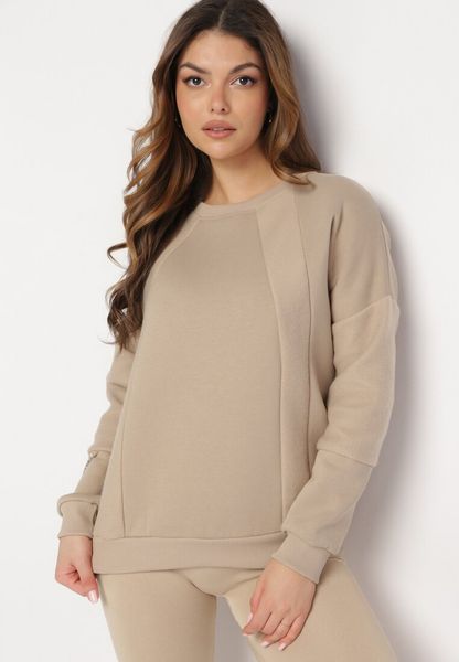 Beżowa Bluza z Ozdobnym Łańcuszkiem Letonia. Brązowe bluzy Born2be, z aplikacjami, z bawełny, bez kaptura. Za 54.99 zł.