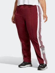Adidas Spodnie sportowe w kolorze bordowym rozmiar: 4X. Czerwone spodnie dresowe adidas, bez wzorów, z materiału. Za 167.67 zł.