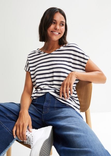 Bluzka z czystego lnu z rękawami typu nietoperz. Niebieskie bluzki bonprix, bez wzorów, ze lnu, bez kołnierzyka, bez ramiączek. Za 124.99 zł.