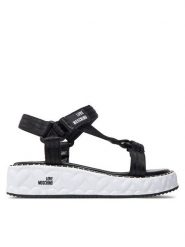 LOVE MOSCHINO Sandały JA16365I0IIX5000 Czarny. Czarne sandały Love Moschino, bez wzorów, ze skóry, bez obcasa, na płaskiej podeszwie, bez zapięcia. Za 1,189.00 zł.