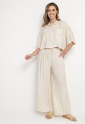 Beżowy Wiskozowy Komplet Oversize Koszula z Krótkim Rękawem i Spodnie Dovilissea. Brązowe koszule Born2be, m, bez wzorów, z wiskozy, eleganckie, bez kołnierzyka, bez ramiączek. Za 169.99 zł.