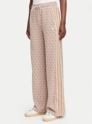 Guess Spodnie dresowe V6YB27 K5181 Beżowy Relaxed Fit. Brązowe spodnie dresowe Guess, z aplikacjami, z dresówki. Za 474.99 zł.