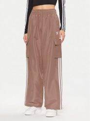 Adidas Spodnie dresowe adicolor 3-Stripes JC8138 Beżowy Loose Fit. Brązowe spodnie dresowe adidas, bez wzorów, z dresówki. Za 229.99 zł.