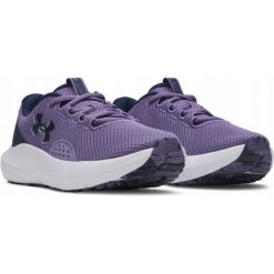 Buty do biegania damskie Under Armour UA Charged Surge 4 3027007-520. Fioletowe buty do biegania Under Armour, bez wzorów, bez zapięcia, do biegania. Za 259.90 zł.