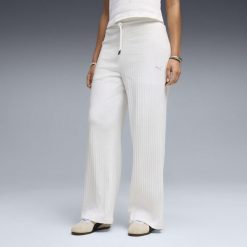 Damskie spodnie z wysokim stanem i szerokimi nogawkami HER PUMA. Białe spodnie sportowe Puma, bez wzorów, do biegania. Za 249.00 zł.
