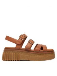 Clarks Sandały Evamar Strap 26185889 Brązowy. Brązowe sandały Clarks, bez wzorów, ze skóry, bez obcasa, na płaskiej podeszwie, bez zapięcia. Za 519.99 zł.