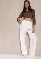 Białe Spodnie o Szerokim Kroju z Wiskozą High Waist z Wiązaniem Jerisia. Białe jeansy Renee, bez wzorów, z jeansu, eleganckie, z podwyższonym stanem. W wyprzedaży za 56.99 zł.