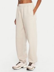 Reebok Spodnie dresowe Reebok X Ewa Chodakowska RK25304CCW Beżowy Regular Fit. Brązowe spodnie dresowe Reebok, bez wzorów, z bawełny. Za 179.99 zł.