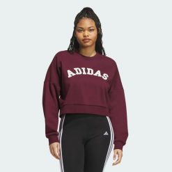 BLUZA Z TKANINY SZENILOWEJ Z LOGO I GRAFIKĄ. Czerwone bluzy bez kaptura adidas, na zimę, xs, z aplikacjami, z bawełny, bez kaptura, trekkingowe. Za 259.00 zł.