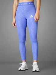 Adidas Legginsy sportowe w kolorze fioletowym rozmiar: XS. Różowe legginsy adidas, bez wzorów, z materiału, sportowe. Za 96.37 zł.