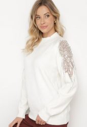 Biały Sweter z Cyrkoniami Perłami i Cekinami Nevalitha. Białe swetry Born2be, na zimę, bez wzorów, bez ramiączek. W wyprzedaży za 118.99 zł.