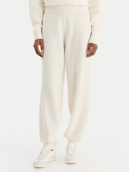 Calvin Klein Underwear Spodnie dresowe LV00QS7569 Écru Regular Fit. Spodnie dresowe Calvin Klein Underwear, bez wzorów, z dresówki. Za 299.99 zł.