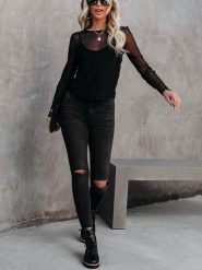 Milan Kiss Bluzka w kolorze czarnym rozmiar: M. Czarne bluzki Milan Kiss, m, bez wzorów, bez kołnierzyka, bez ramiączek. Za 174.43 zł.