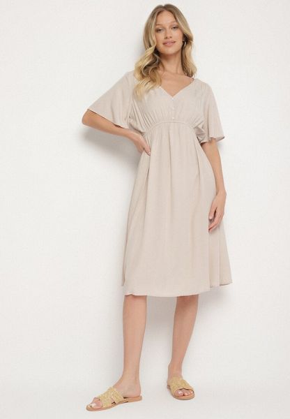 Beżowa Bawełniana Sukienka o Rozkloszowanym Fasonie Liranelle. Brązowe sukienki Born2be, na co dzień, l, bez wzorów, z bawełny, eleganckie, bez kołnierzyka, bez ramiączek, midi, rozkloszowane. Za 49.99 zł.