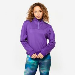 Bluza damska Domyos fitness. Fioletowe bluzy DOMYOS, l, bez wzorów, z elastanu, bez kaptura, na fitness i siłownię. W wyprzedaży za 44.99 zł.