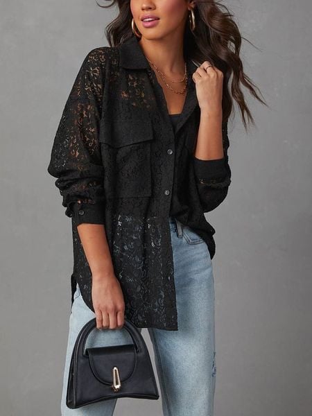 Milan Kiss Bluzka w kolorze czarnym rozmiar: M. Czarne bluzki Milan Kiss, m, bez wzorów, z koronki, bez kołnierzyka, bez ramiączek. Za 175.67 zł.