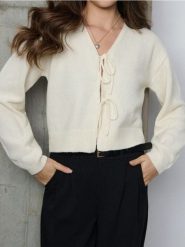 Sweter z kokardami - żółty. Żółte swetry Sinsay, l, bez wzorów, bez ramiączek. Za 49.99 zł.