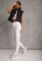 Białe Legginsy Basic z Modelującą Wstawką w Pasie Liacan. Białe legginsy Renee, bez wzorów, z jeansu, casualowe, krótkie. Za 49.99 zł.