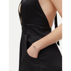 Bransoletka Guess. Żółte bransoletki Guess, złote. Za 209.99 zł.
