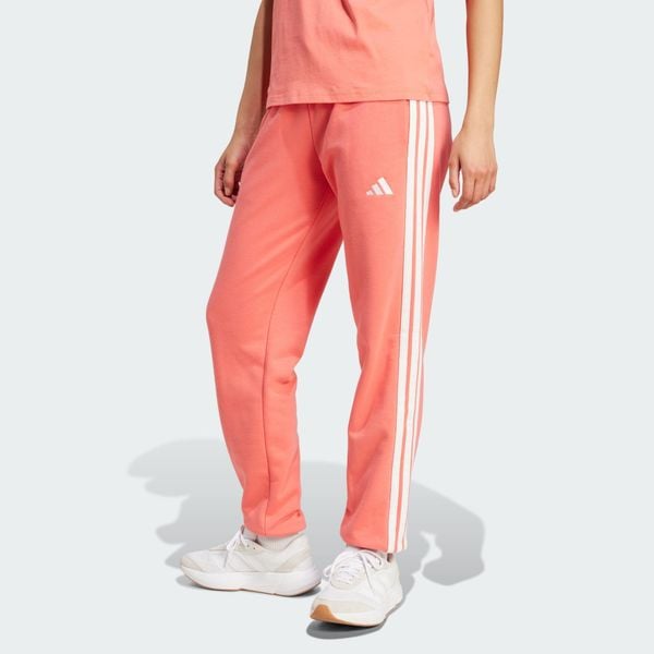 Spodnie Essentials 3-Stripes French Terry Cuffed. Białe spodnie dresowe adidas, bez wzorów, z materiału, na fitness i siłownię. Za 219.00 zł.