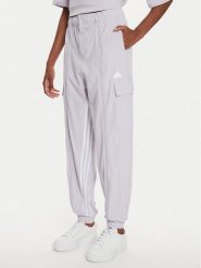 Adidas Spodnie dresowe Dance All-Gender Versatile IS0907 Fioletowy Loose Fit. Fioletowe spodnie dresowe adidas, bez wzorów, z dresówki. Za 379.99 zł.