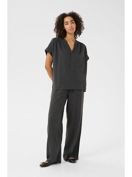 Kaffe Bluzka "Milia" w kolorze czarnym rozmiar: 36. Czarne bluzki Kaffe, bez wzorów, z włókna, bez kołnierzyka, bez ramiączek. Za 70.08 zł.