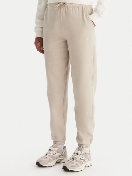 Reebok Spodnie dresowe Reebok X Ewa Chodakowska Evren RK25308CCW Beżowy Regular Fit. Brązowe spodnie dresowe Reebok, bez wzorów, z dresówki. Za 179.99 zł.