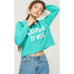 Bluza z nadrukiem - Turkusowy. Bluzy marki Sinsay. W wyprzedaży za 19.99 zł.