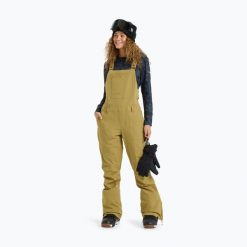 Spodnie snowboardowe damskie ROXY Rideout Bib. Brązowe spodnie narciarskie Roxy, bez wzorów, z materiału, narciarskie, primaloft. Za 1,166.95 zł.