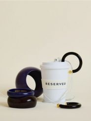 Okrągłe kolczyki - ciemnobrązowy. Brązowe kolczyki Reserved. Za 99.99 zł.