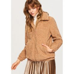Krótka kurtka - Fioletowy. Kurtki marki QUECHUA. W wyprzedaży za 99.99 zł.