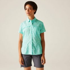 Travel Packaway damska koszula z krótkim rękawem. Białe koszule Regatta, bez wzorów, eleganckie, bez kołnierzyka, bez ramiączek. Za 232.00 zł.