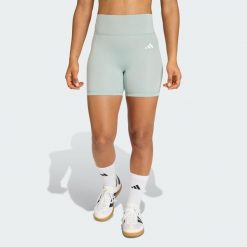 Krótkie legginsy Optime Essentials Workout. Zielone legginsy adidas, bez wzorów, sportowe, krótkie. Za 179.00 zł.