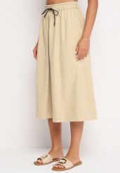 Beżowa Rozkloszowana Spódnica z Gumką w Pasie i Ściągaczem Xegelia. Brązowe spódnice Born2be, na co dzień, uniwersalny, bez wzorów, eleganckie, midi, dopasowane. Za 39.99 zł.