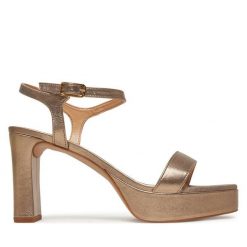 Sandały Unisa. Żółte sandały Unisa, bez wzorów, bez obcasa, na słupku, bez zapięcia. Za 379.99 zł.