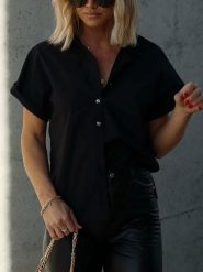 LA Angels Bluzka w kolorze czarnym rozmiar: M. Czarne bluzki LA Angels, m, bez wzorów, z bawełny, bez kołnierzyka, bez ramiączek. Za 175.67 zł.