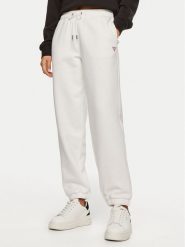 Guess Spodnie dresowe W4YB33 KC811 Biały Regular Fit. Białe spodnie sportowe Guess, z aplikacjami, z bawełny. Za 229.99 zł.