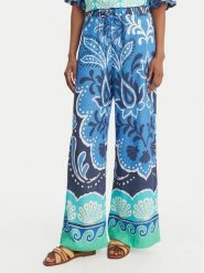 Banana Moon Spodnie materiałowe Alcaniz Cleariv MYY56 Błękitny Regular Fit. Niebieskie spodnie materiałowe Banana Moon, bez wzorów, z materiału. Za 529.99 zł.