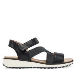 Sandały Caprice. Czarne sandały Caprice, bez wzorów, bez obcasa, na koturnie, bez zapięcia. Za 339.99 zł.