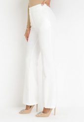 Kremowe Spodnie Dzwony w Paski Hippiala. Brązowe jeansy Born2be, bez wzorów, z jeansu, eleganckie. Za 129.99 zł.