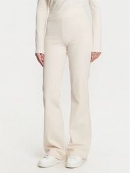 Guess Spodnie dzianinowe V5RB06 KCLH0 Écru Regular Fit. Spodnie dresowe Guess, z aplikacjami, z dzianiny. Za 179.99 zł.