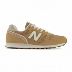 Damskie trampki na co dzień New Balance 373 v2 Kobieta. Brązowe trampki New Balance, bez wzorów, z zamszu, bez zapięcia, New Balance 373. Za 397.00 zł.