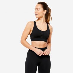 Stanik sportowy Decathlon. Czarne biustonosze sportowe DOMYOS, bez wzorów, ze skóry, na fitness i siłownię. Za 89.99 zł.