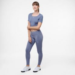 Legginsy fitness damskie Puma. Fioletowe legginsy Puma, bez wzorów, ze skóry, sportowe. Za 129.99 zł.