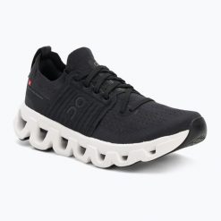 Buty do biegania damskie On Cloudswift 4 black/white. Czarne buty do biegania On, bez wzorów, z gumy, bez zapięcia, do biegania. Za 799.75 zł.