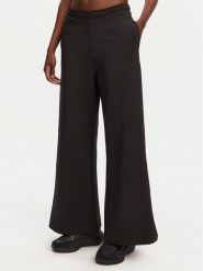 HUGO Spodnie dresowe Nalosia 50530447 Czarny Loose Fit. Czarne spodnie dresowe Hugo, bez wzorów, z bawełny. Za 339.99 zł.