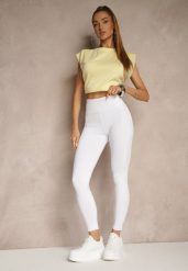 Białe Legginsy z Ozdobnymi Przeszyciami z Efektem Modelowania Carittia. Białe legginsy Renee, bez wzorów, z jeansu, eleganckie, długie. W wyprzedaży za 47.99 zł.